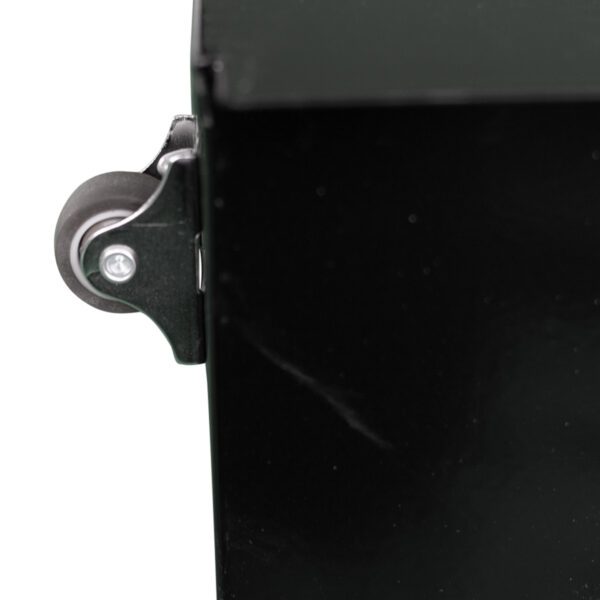 close up of castor wheel on a black box.